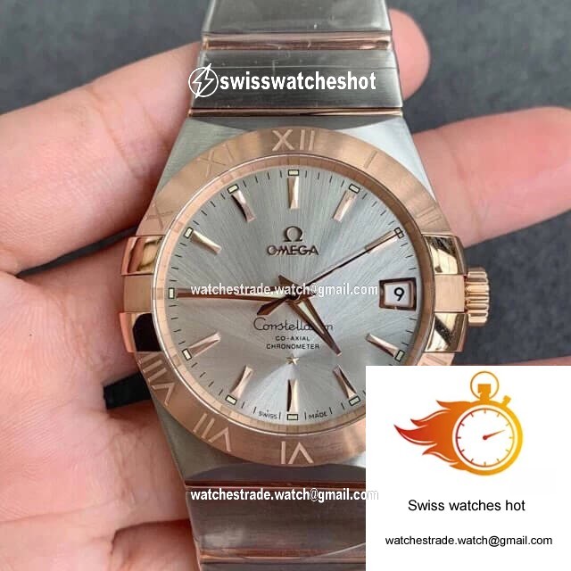 Omega Constellation 123.20.38.21.02.001 VS Factory Gold Bezel 1