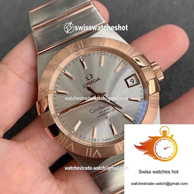 Omega Constellation 123.20.38.21.02.001 VS Factory Gold Bezel 2