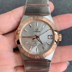 Omega Constellation 123.20.38.21.02.001 VS Factory Gold Bezel